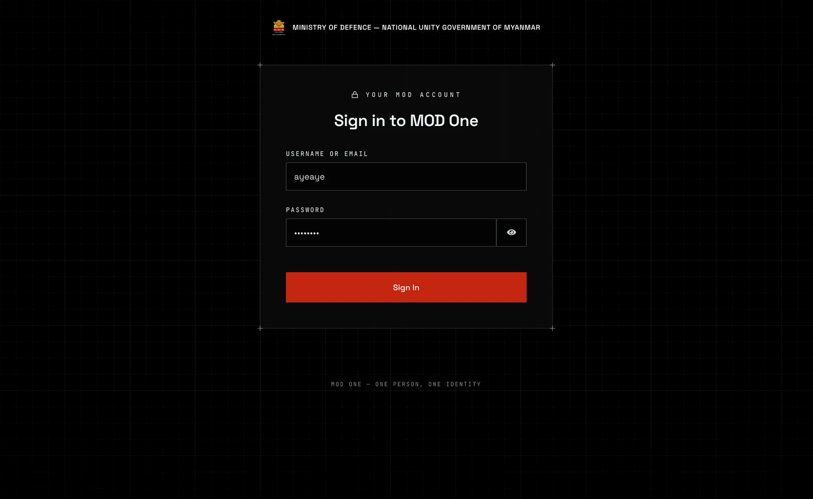 A black page with a faint grid, the Ministry of Defence crest and name across the top. A panel headed YOUR MOD ACCOUNT and Sign in to MOD One holds a filled Username or email field, a Password field with an eye button beside it, and a red Sign In button.