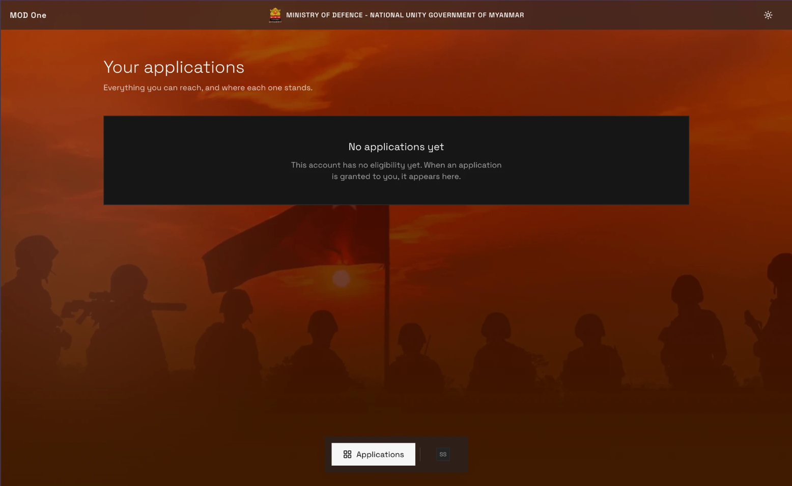 A portal page headed Your applications over a dark orange photographic background. In place of any tiles, a single dark box reads No applications yet, with a line underneath saying the account has no eligibility yet. A small bar at the bottom of the page holds an Applications button and a round badge with the person's initials.